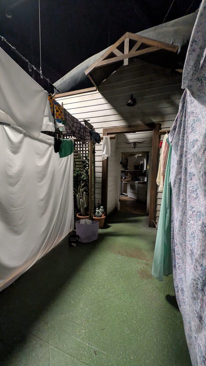 Lights-on interior of the Alien Abduction house at HHN 35