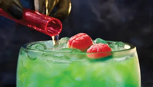 Applebee's Tipsy Zombie 2026 Halloween cocktail topped with gummi brains