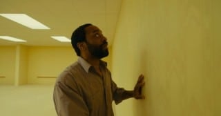 Chiwetel Ejiofor in the yellow rooms in A24's Backrooms