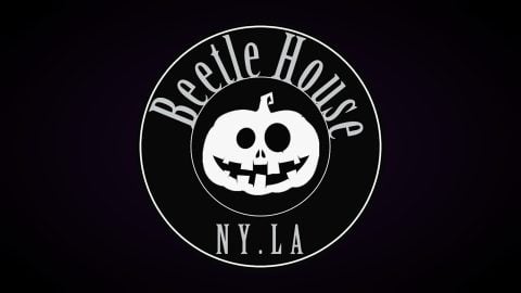 The Beetle House NY.LA pumpkin logo on a dark background