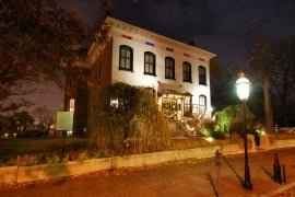 The Lemp Mansion in St. Louis lit at dusk