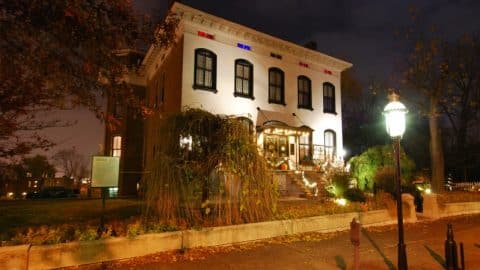 The Lemp Mansion in St. Louis lit at dusk