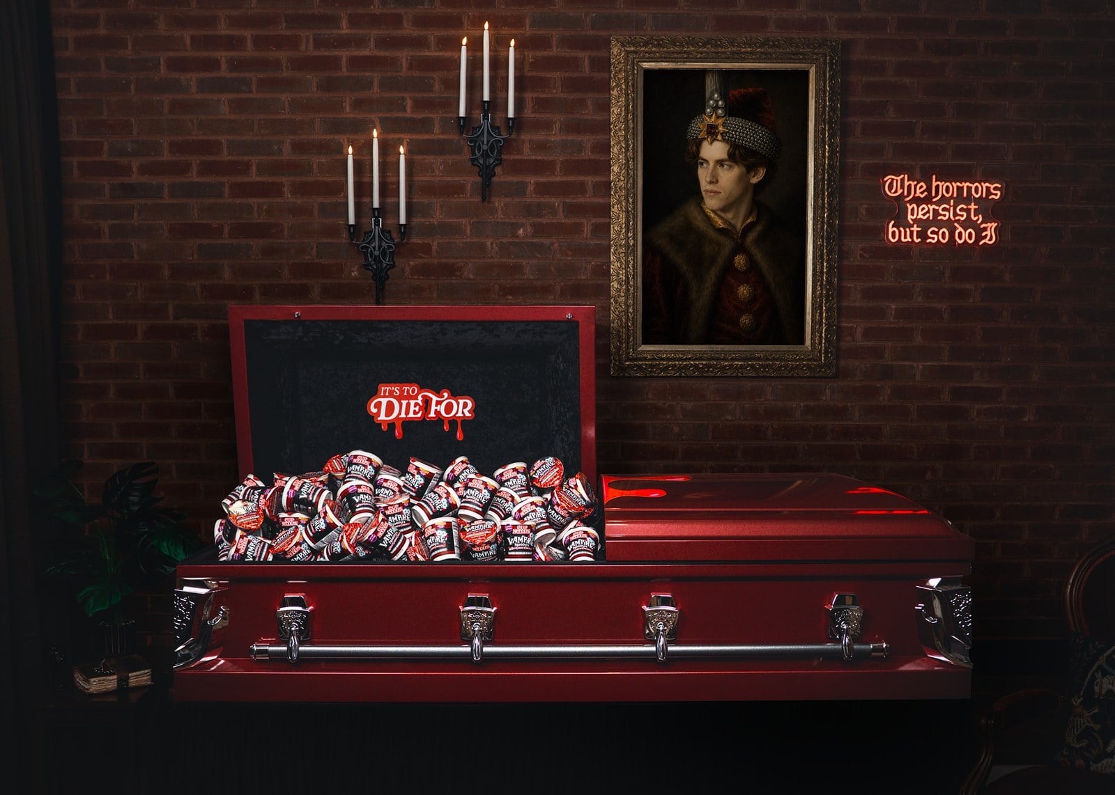 The maroon Cup Noodles x Titan Casket Vampire Noodles Casket, open to its It's To Die For head panel and filled with Vampire Noodles cups