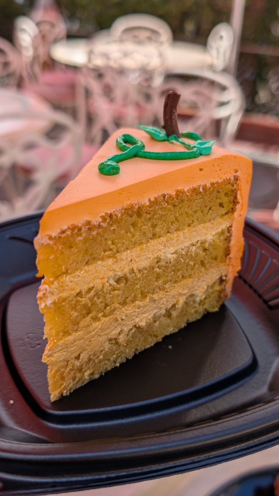 A slice of layered pumpkin cake from Plaza Inn at Disneyland