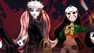 Four horror fashion dolls against a dark red splatter backdrop: Billy the Puppet in a pinstripe suit and red bow tie, Pinhead with red and white pigtails, Jason in a hockey mask holding a machete, and Ghost Face in a black hood