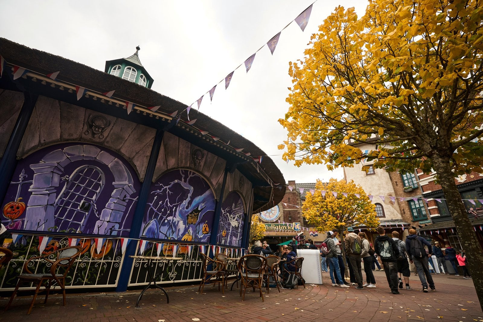 Halloween murals and autumn trees in one of Europa-Park's themed areas