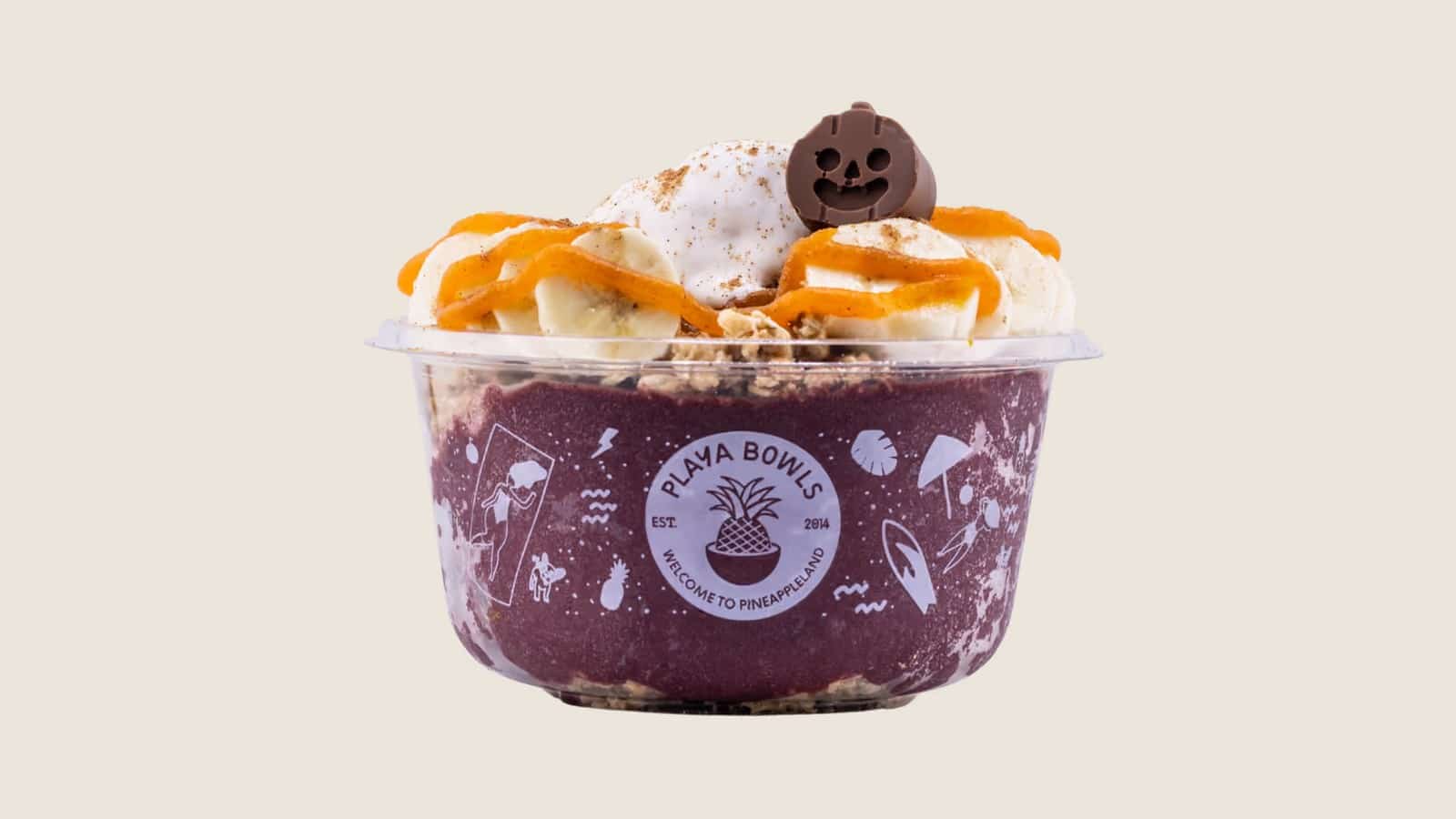 Playa Bowls Happy Pumpkin Acai Bowl with a chocolate jack-o'-lantern