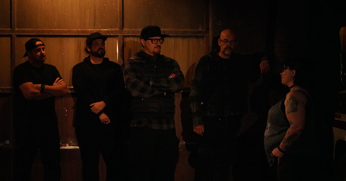 Zak Bagans and the Ghost Adventures crew investigating a dark location