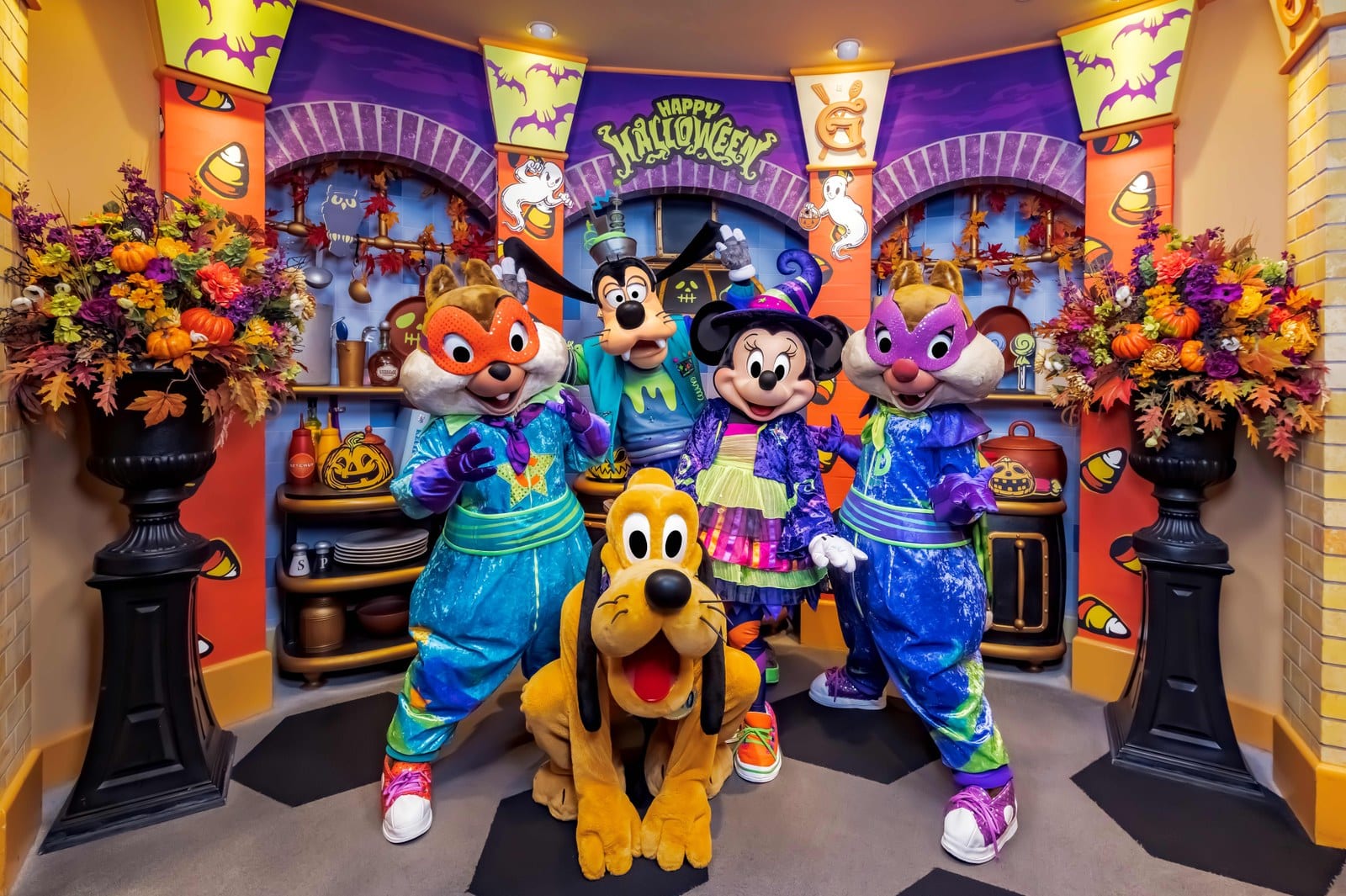 Goofy, Mickey, Pluto, and friends in Halloween outfits at Goofy's Kitchen at the Disneyland Hotel