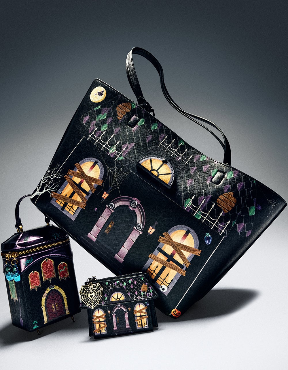 Betsey Johnson Boo and Breakfast tote, Haunted Castle bag, and wallet arranged together