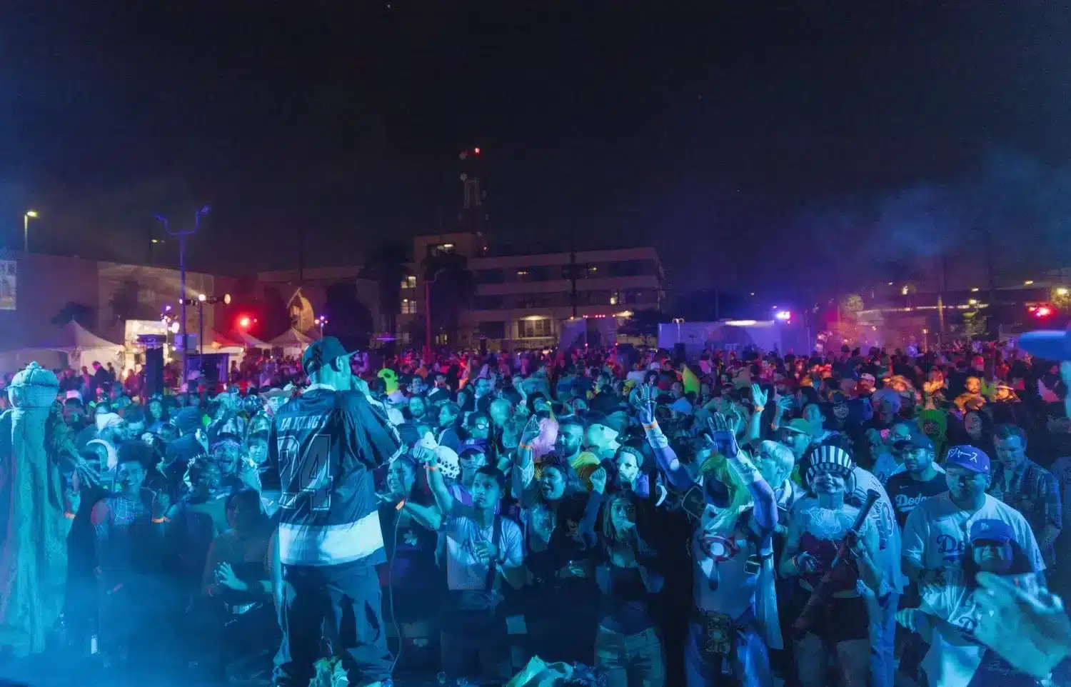 A costumed crowd at the Haunted Little Tokyo block party at night