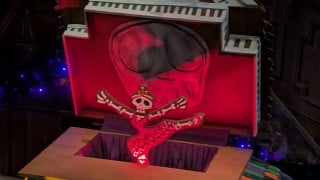 The 2026 Haunted Mansion Holiday gingerbread music box with a skeleton ballerina rising from its red lid