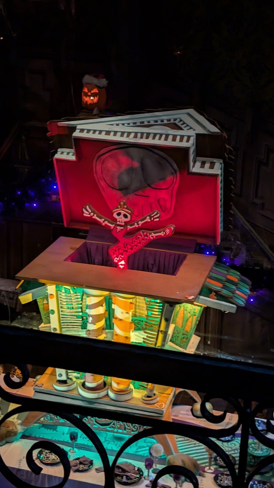 The 2026 Haunted Mansion Holiday gingerbread house, a music box with a skeleton ballerina, in the ballroom