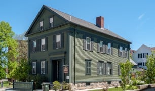 The Lizzie Borden House, a green Victorian home in Fall River, Massachusetts, now a museum and bed-and-breakfast.
