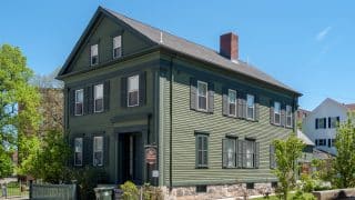 The Lizzie Borden House, a green Victorian home in Fall River, Massachusetts, now a museum and bed-and-breakfast.