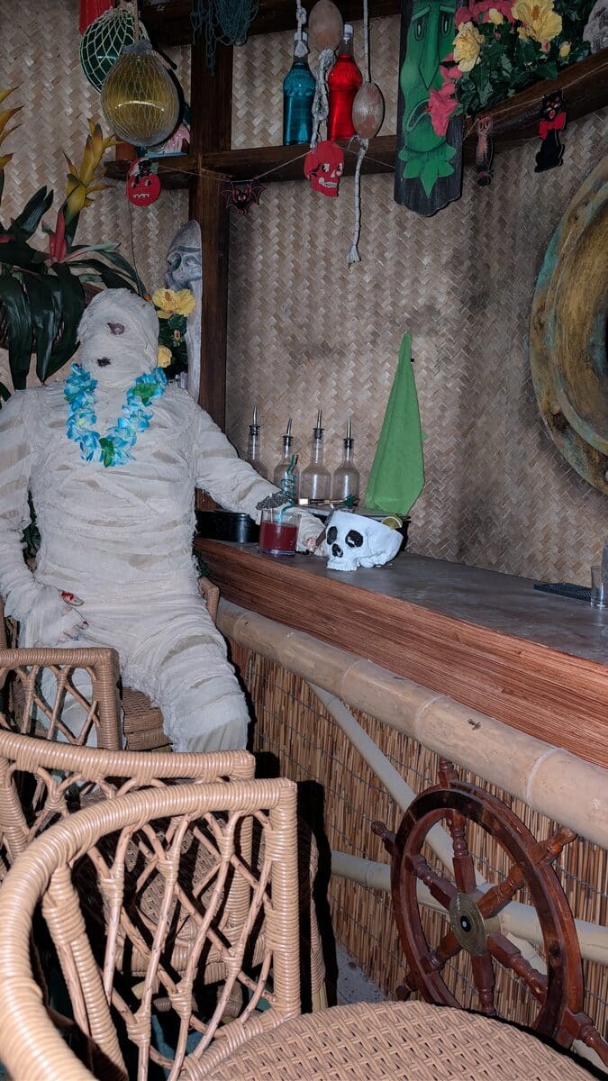 A mummy at the tiki bar in A Monsters' Night Out