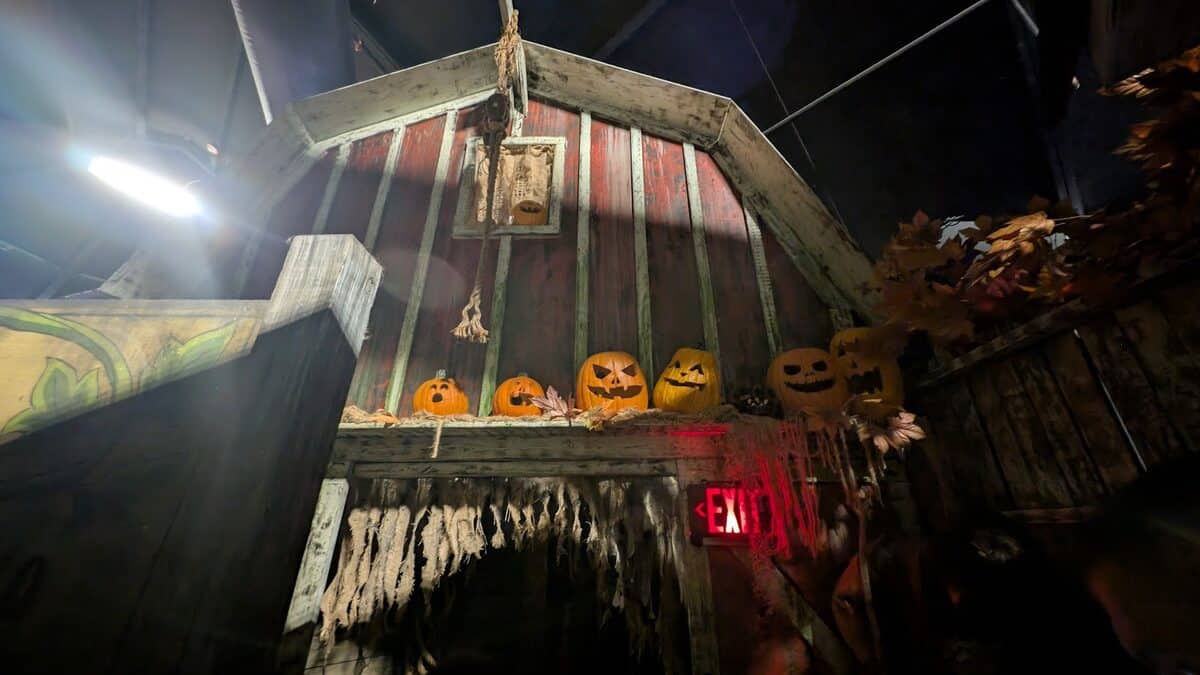Barn scene with carved jack-o'-lanterns in the Bloodengutz house