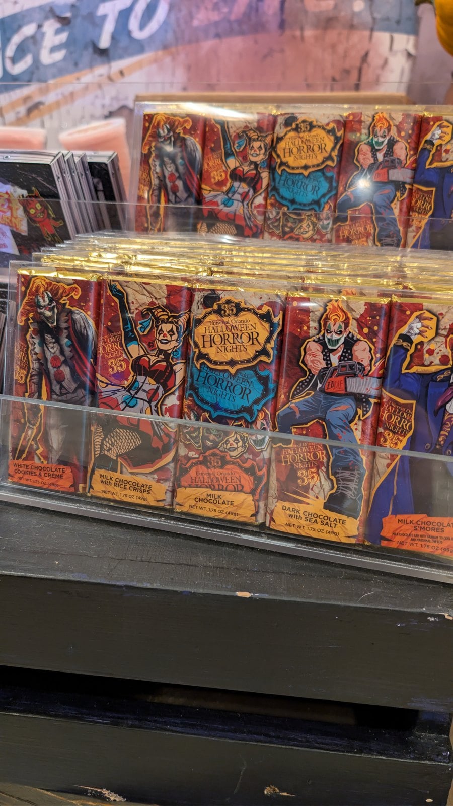 Halloween Horror Nights 35 Icons Chocolate Bars with Jack the Clown, Chance, Eddie, Dr. Oddfellow, and the HHN 35 logo