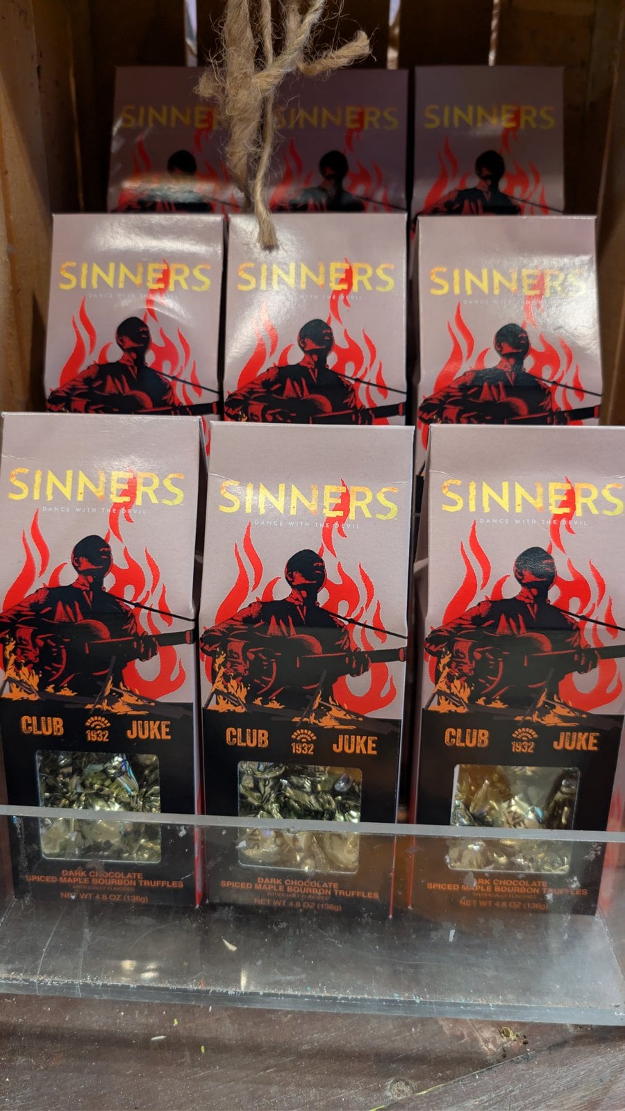 Boxes of Sinners Club Juke dark chocolate spiced maple bourbon truffles at Universal Studios Florida