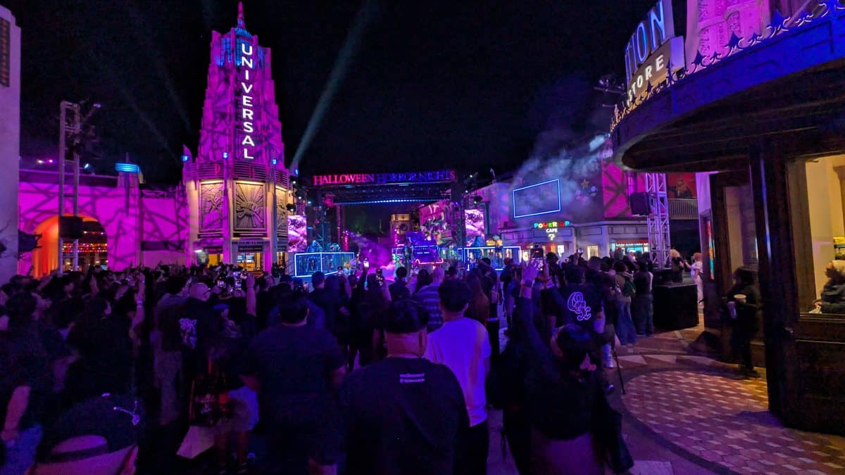 A packed crowd at Halloween Horror Nights Hollywood at night