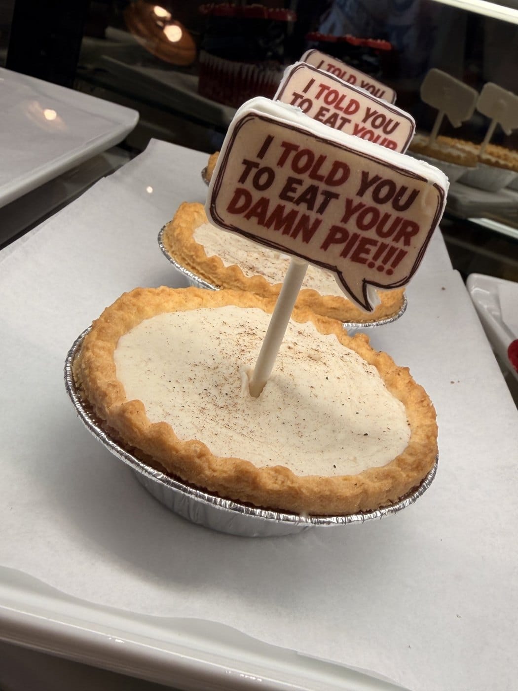 Stranger Things pie dessert with an I told you to eat your damn pie topper