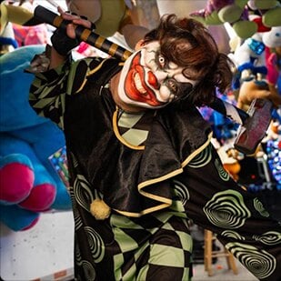 A scare actor at House of Horror Haunted Carnival in Miami