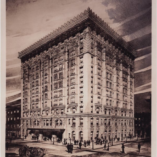 A sepia historical image of the multi-story Hotel Monteleone with early automobiles and pedestrians on the street below