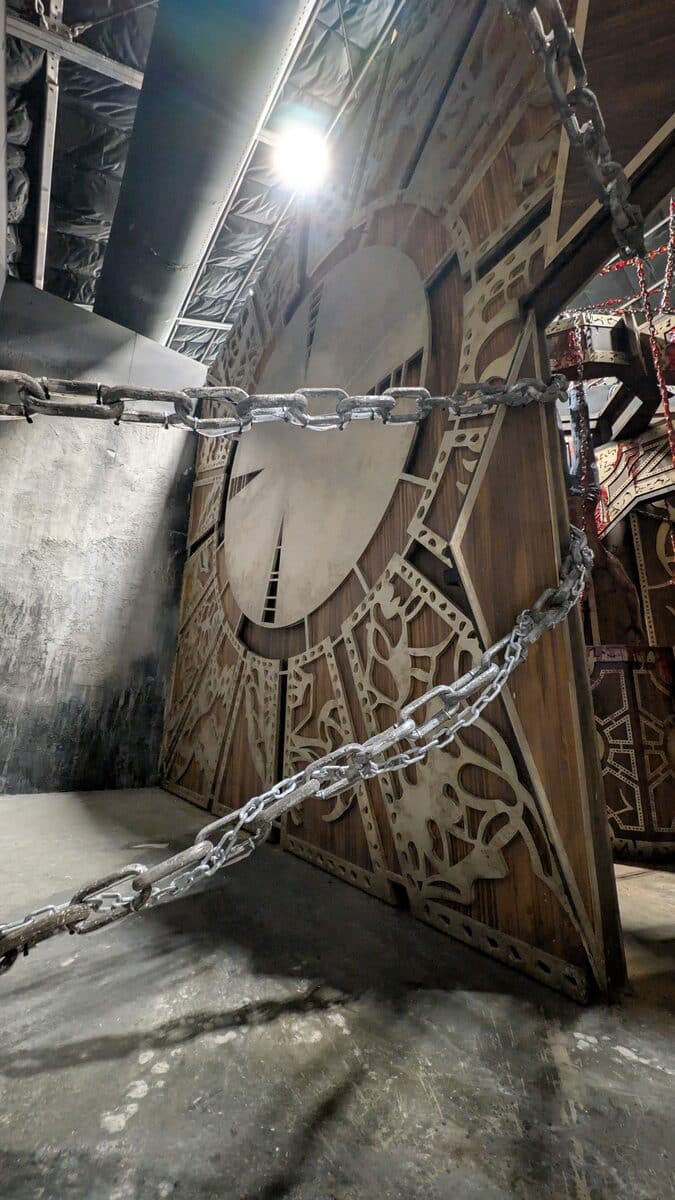 Towering Lament Configuration set piece wrapped in chains in the Hellraiser house