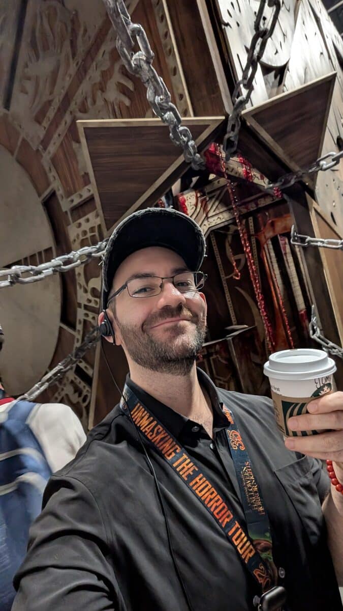 HAN editor Philip Hernandez inside the HHN 35 Hellraiser house with the lights on
