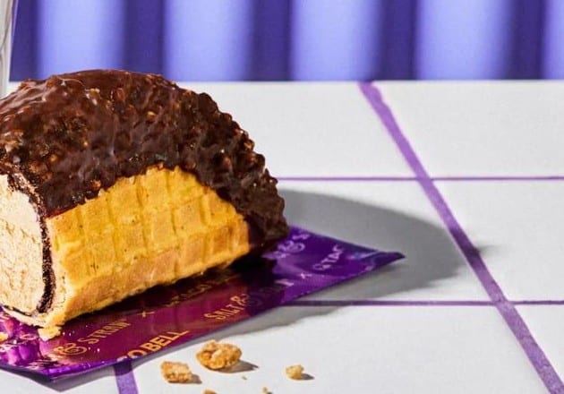 Taco Bell's Salt & Straw Churro Ice Cream Taco, a waffle cone shell with a dark chocolate coating