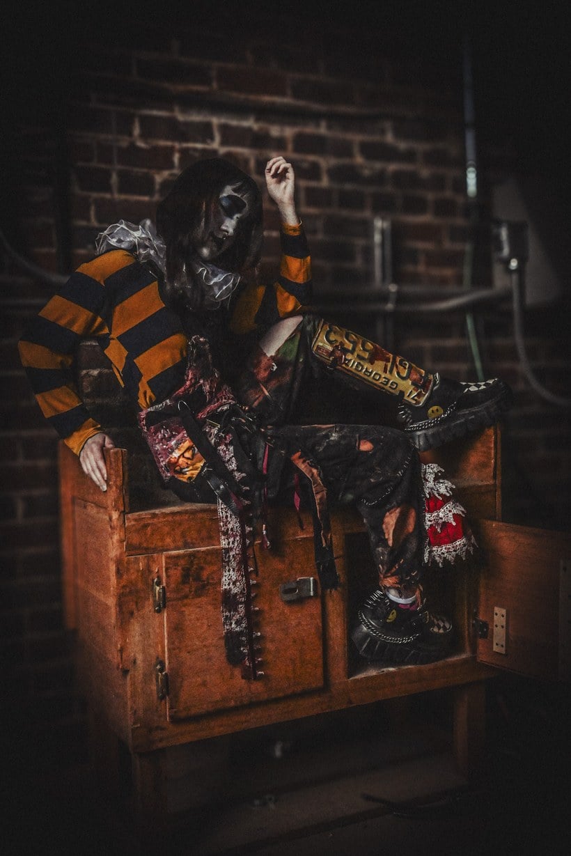 A clown lit in red at the Buford Trail of Terror