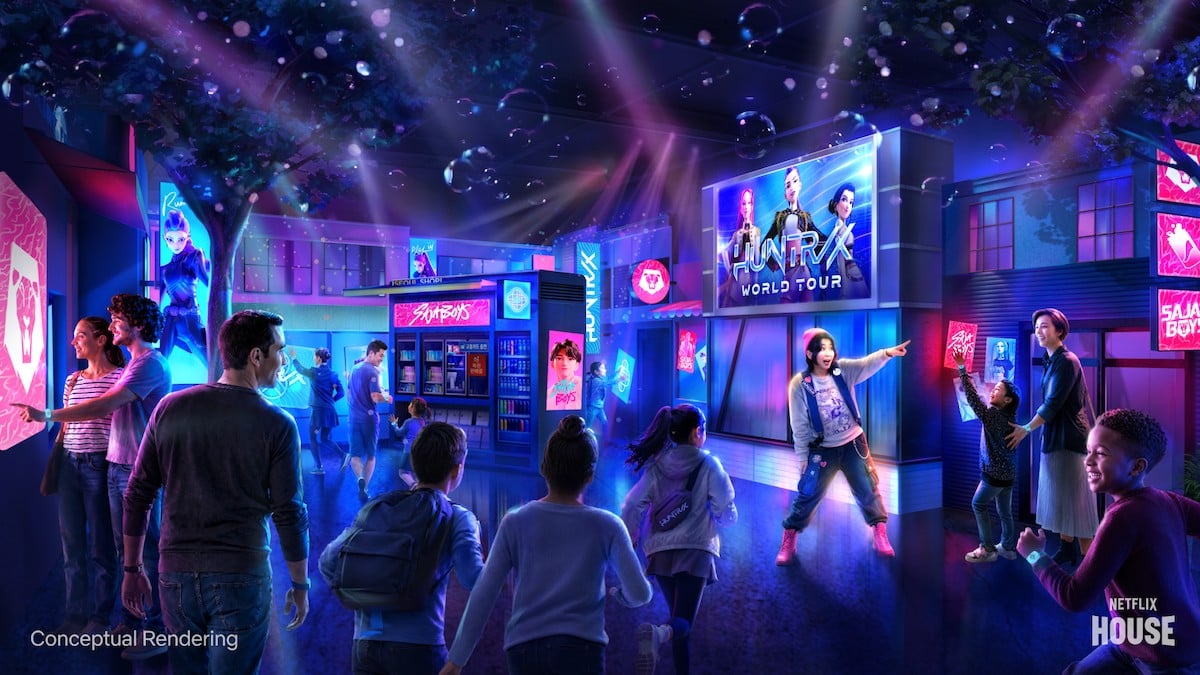 Conceptual rendering of guests walking a neon-lit Seoul street with HUNTR/X World Tour signage