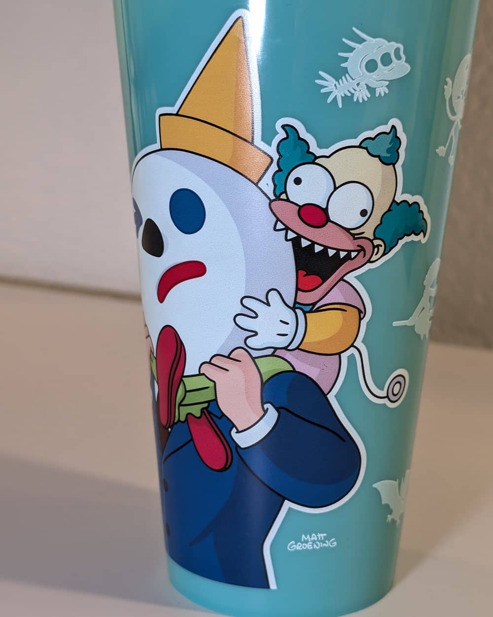 A Jack in the Box Treehouse of Horror collectible cup with Jack and Krusty