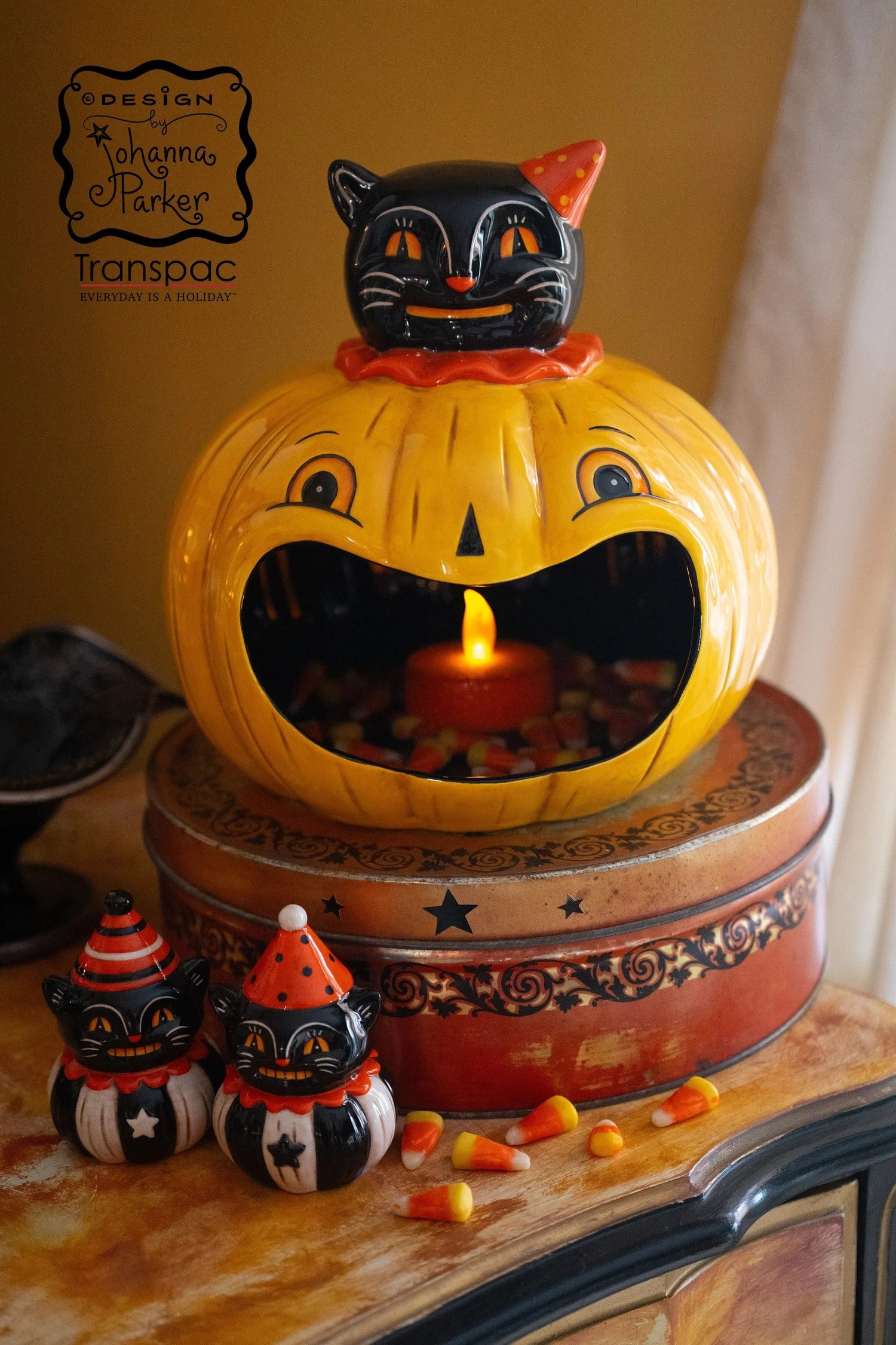 Johanna Parker Black Cat Jack Big Mouth Bowl, a mustard jack-o-lantern candy bowl filled with candy corn