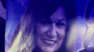 Laurie, a member of the Woods of Terror family, smiling