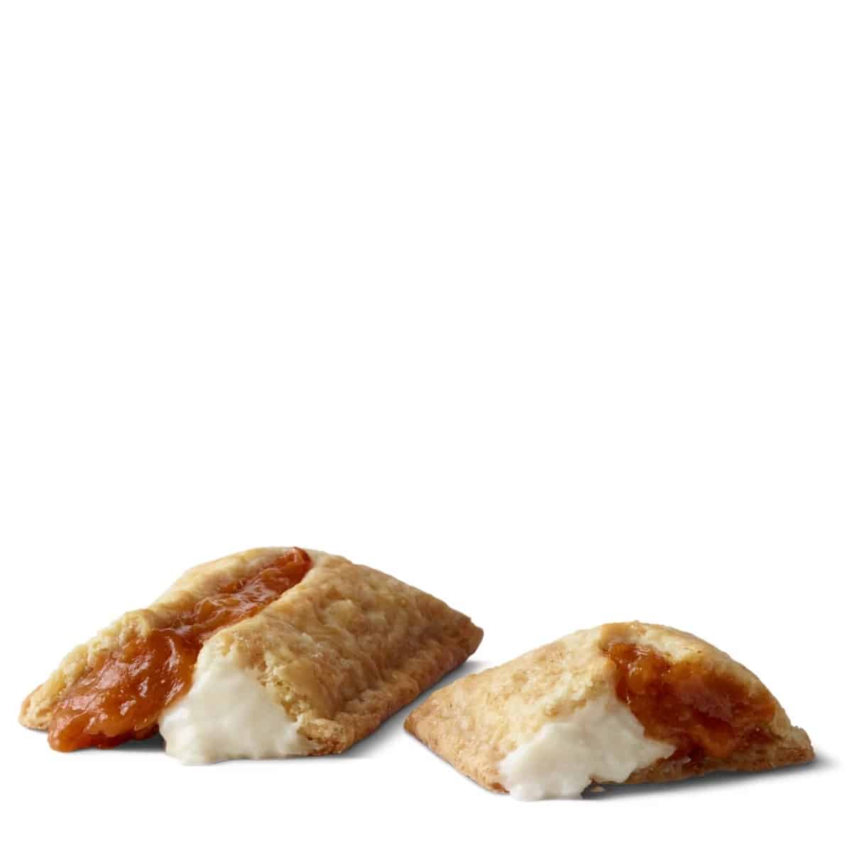 McDonald's Pumpkin & Crème Pie cut open, showing the pumpkin filling on one side and the crème filling on the other