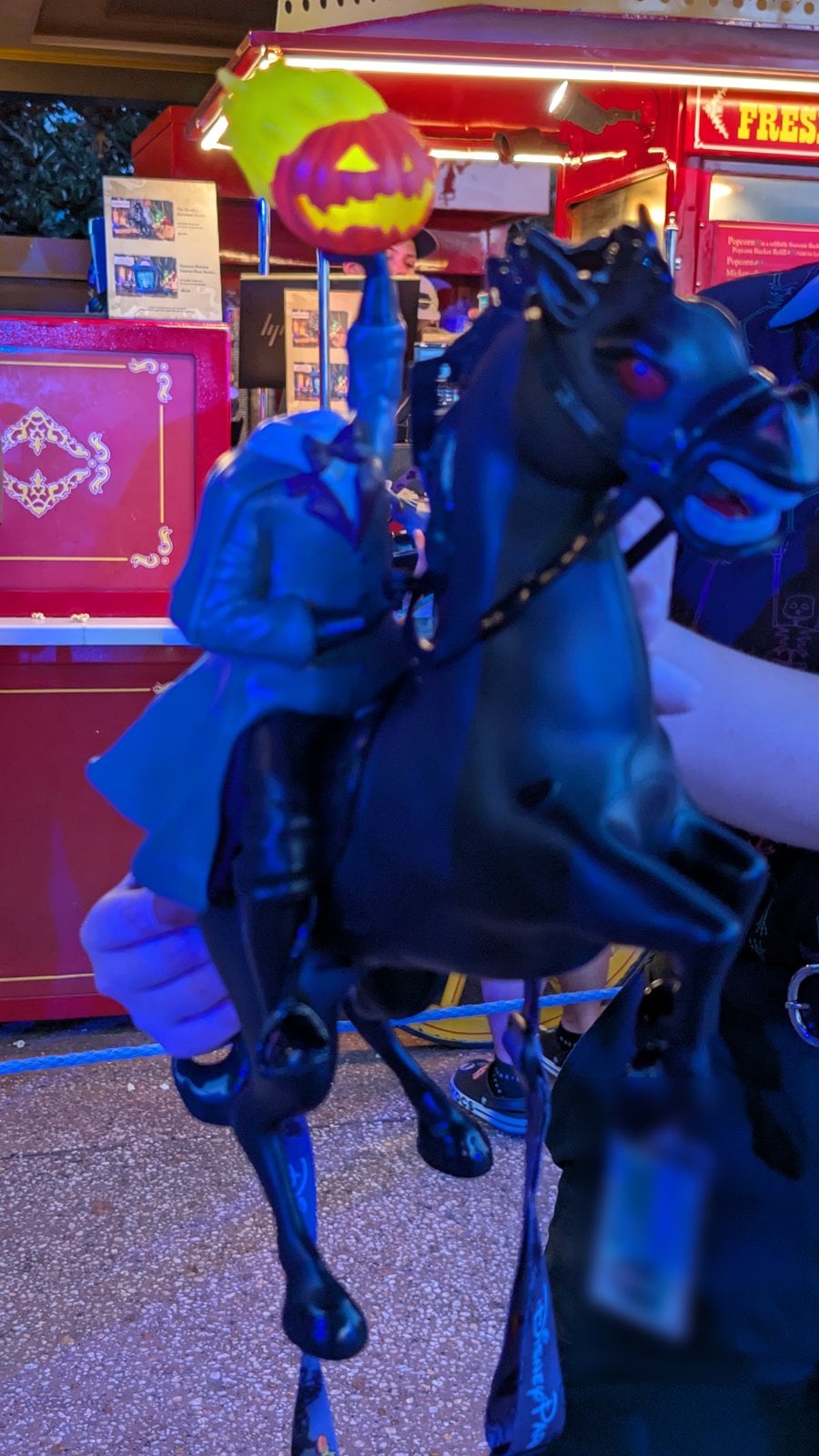 The Headless Horseman popcorn bucket, a horse and rider holding a jack-o'-lantern, at Mickey's Not-So-Scary Halloween Party 2026