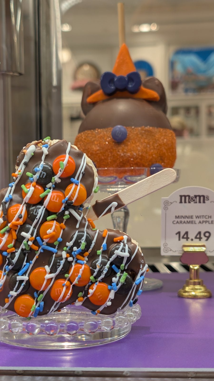 A Minnie Witch Caramel Apple priced at $14.49 at Magic Kingdom