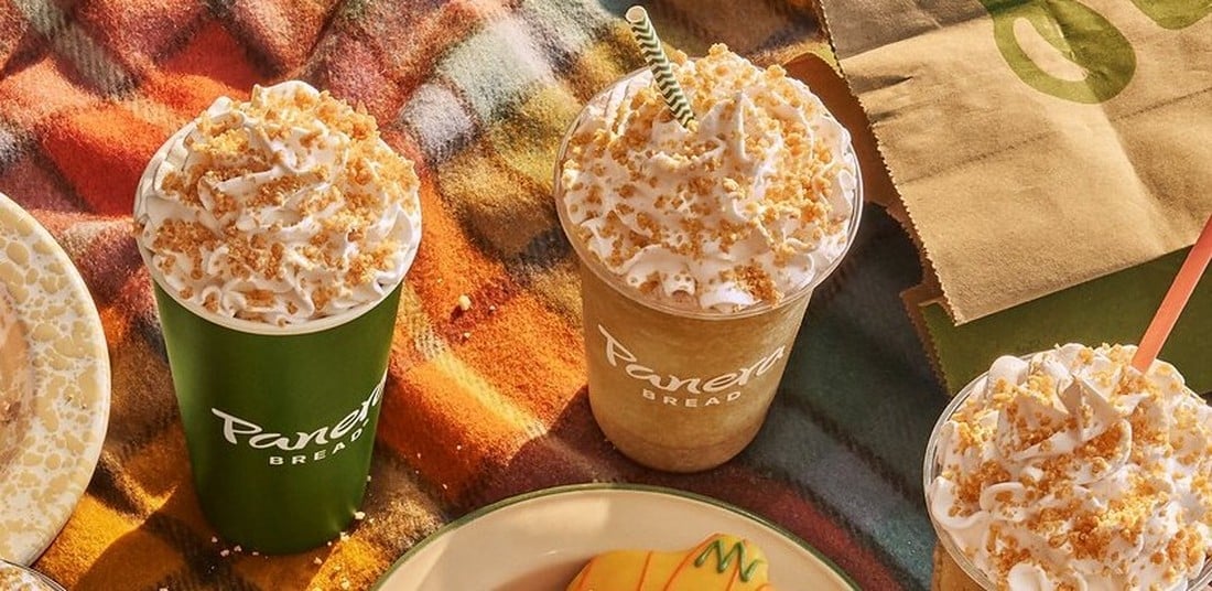 Panera Pumpkin Spice Latte, Frozen Java, and iced fall drinks with whipped cream and pumpkin spice crumbles