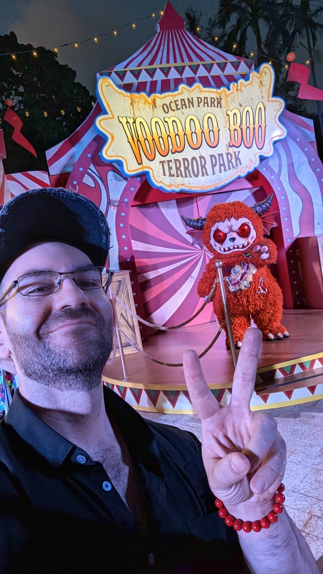 Philip Hernandez takes a selfie with Voodoo Boo on its photo stage at Ocean Park Hong Kong