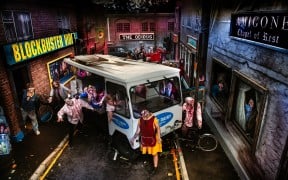 Costumed scare actors and a milk float in the Doom Town street scene at Tulleys Farm's Shocktober Fest