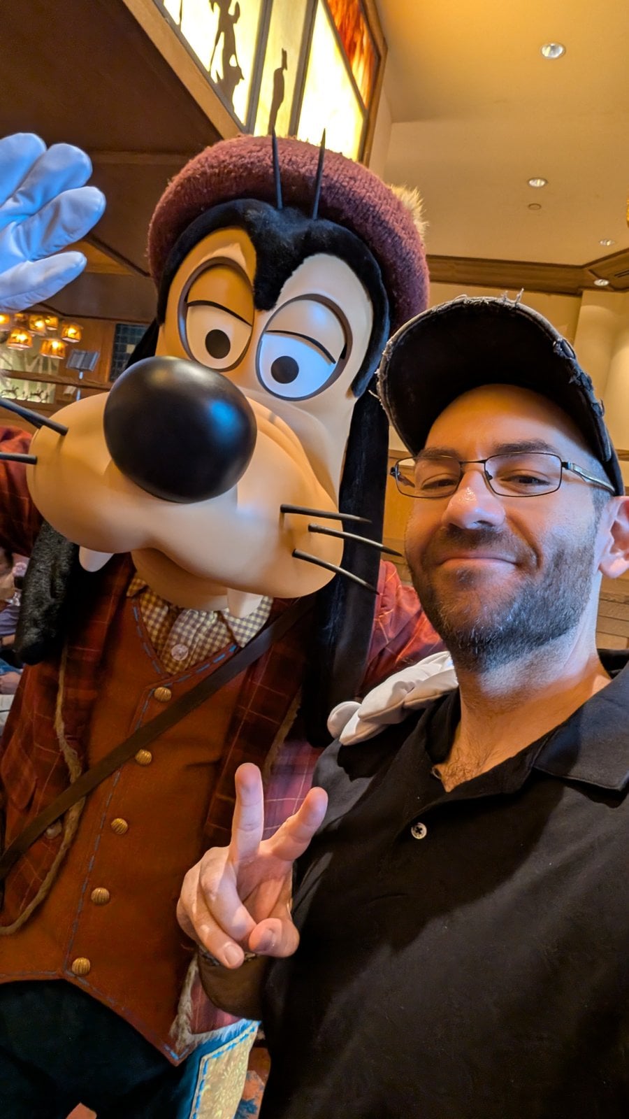 Goofy in his fall outfit at Clarabelle's Enchanted Halloween Dinner, with Philip Hernandez