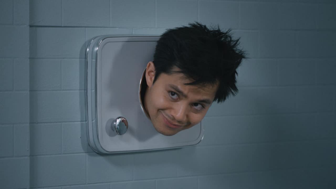 A scene from The Terrors of Jordan Mendoza with a head emerging from a restroom hand dryer
