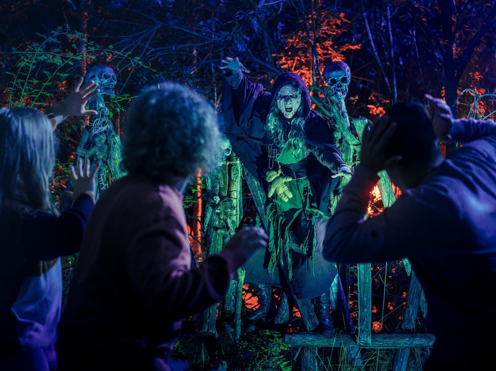 Witches at pagan rituals in the fog at Toverland's The Witches Forest haunted experience behind Avalon